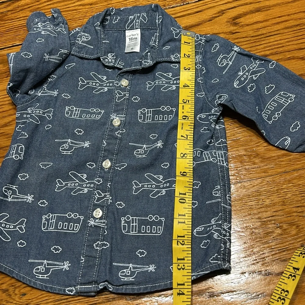 Carter’s blue and white long sleeve shirt. Excellent condition. Size 18 Months.